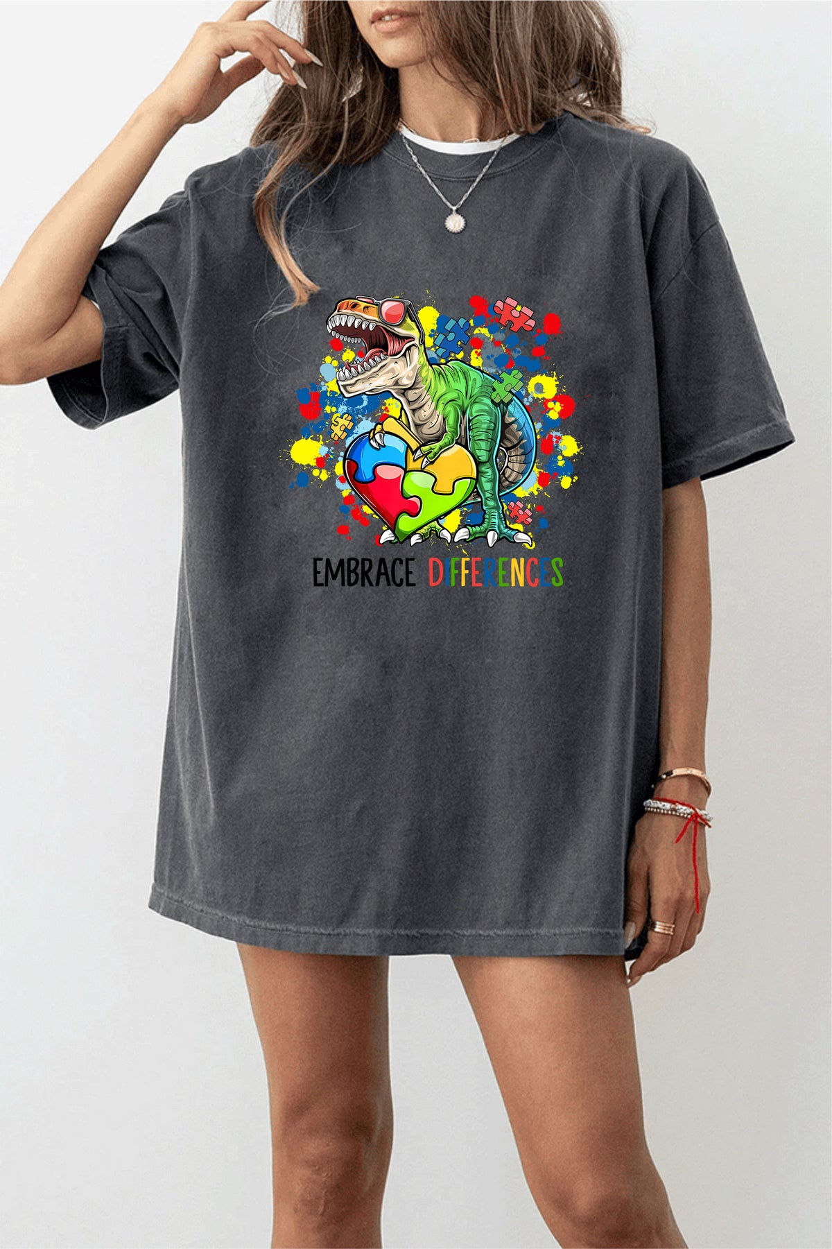 Embrace Differences Autism Awareness Dinosaur T-Shirt